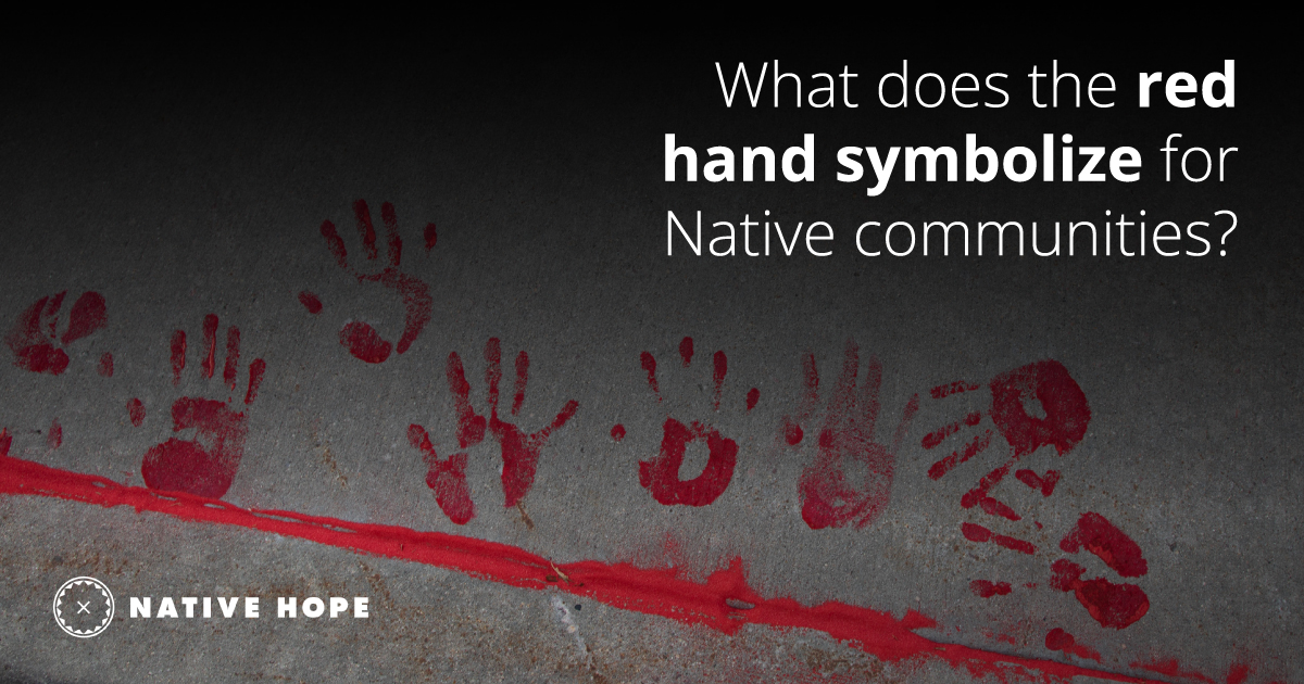 what does the red hand symbolize for Native communities?
